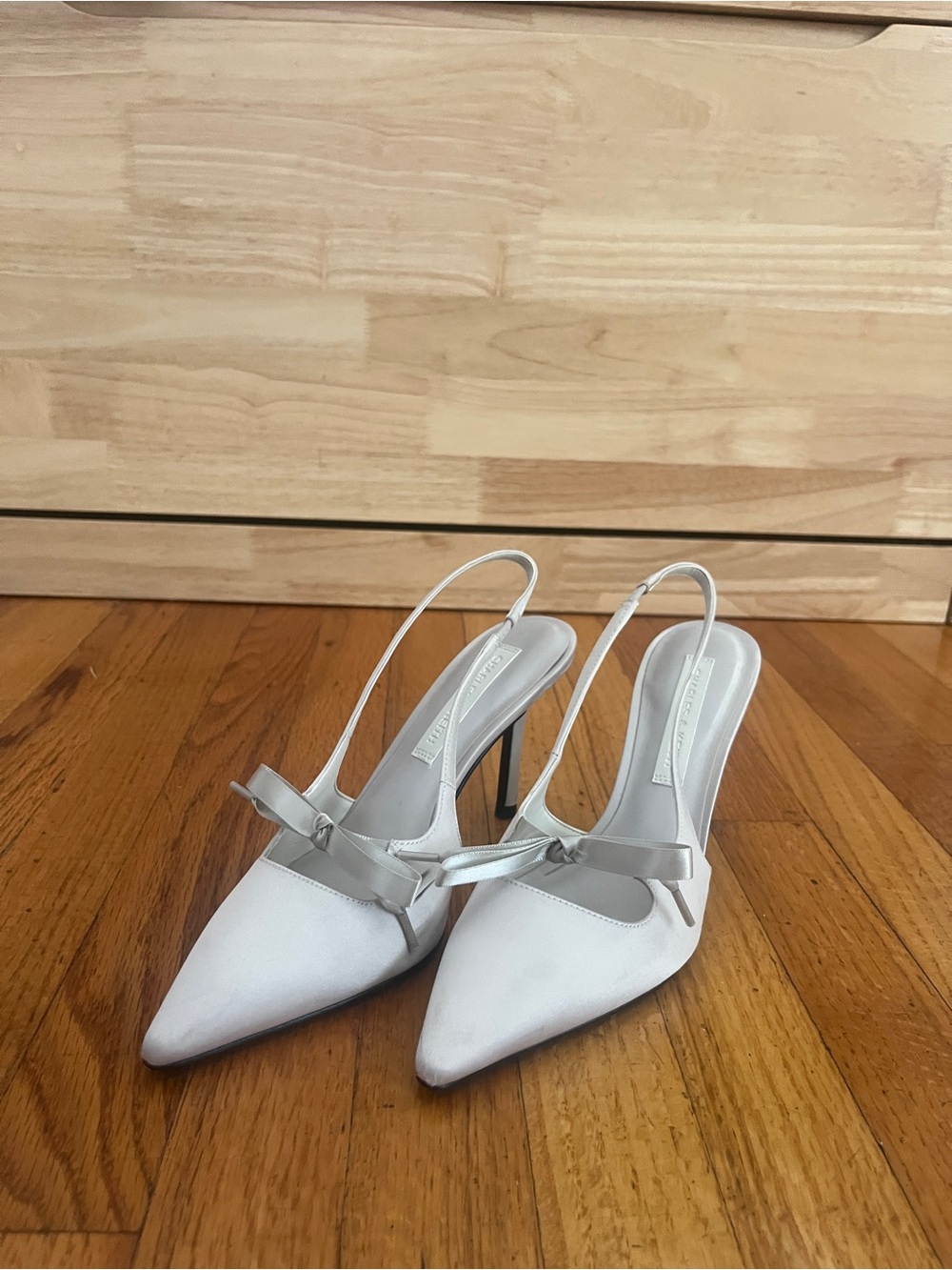 Charles & Keith White Slingback Pointed Heels with Bow Accent